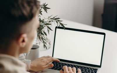 Man working at a desk with laptop